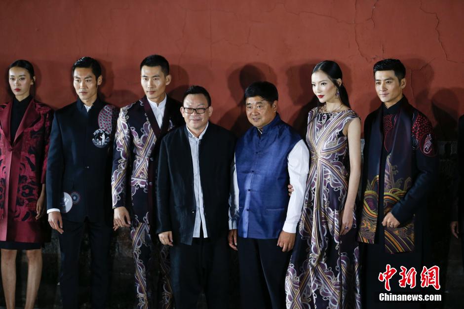 Fashion show staged in Forbidden City at night
