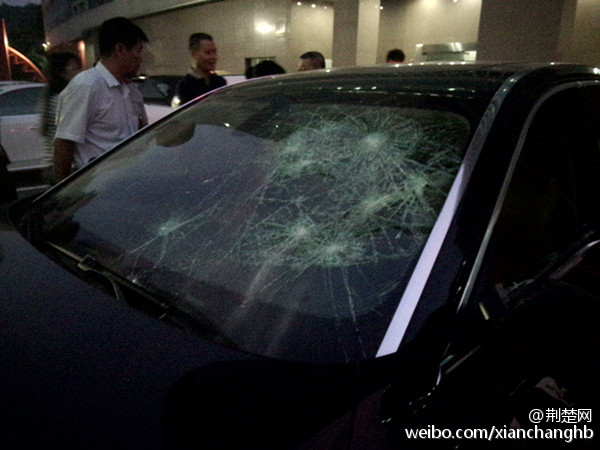 Suspecting husband of cheating, wife smashes his BMW car