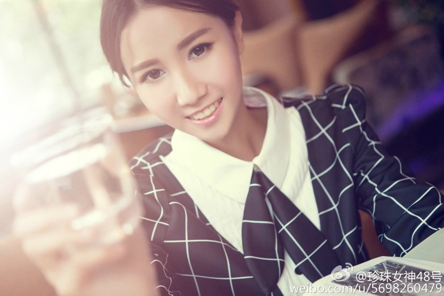 Beautiful PhD student sells fried rice on street: 
Media hype or true story?