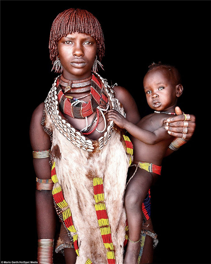 Photographer spends seven years taking intimate portraits of African tribes 