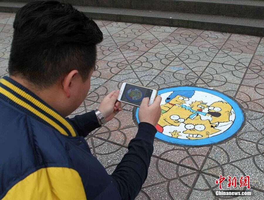 Graffiti on Well Lids Add Colors to the Winter