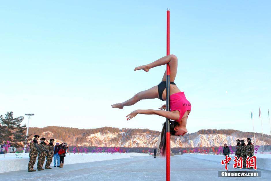 Pole dancers conduct winter training in NE China