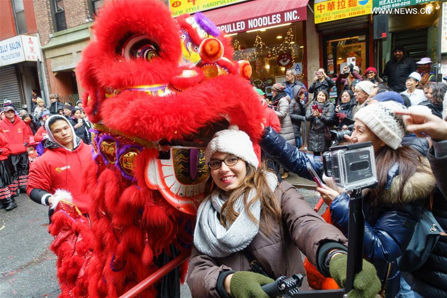People celebrate Chinese Lunar New Year at Manhattan's Chinatown in New York