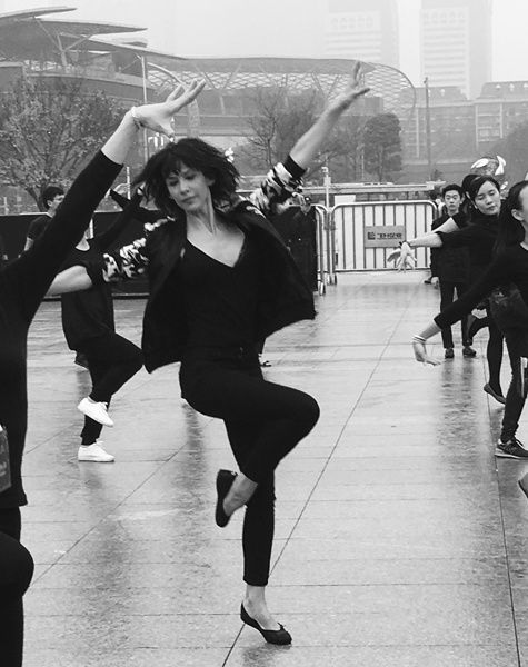 Sophie Marceau goes square dancing in Guangzhou 