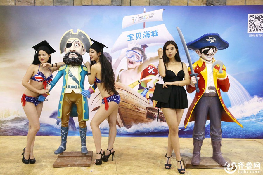 Students take stylish bikini graduations photos
