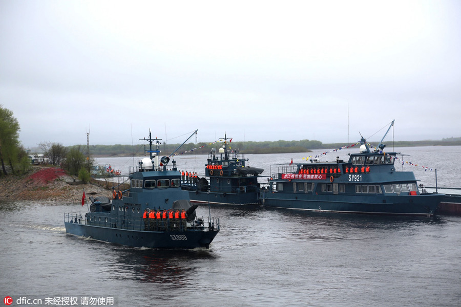 Hundreds of patrol boats set sail in China-Russia border river
