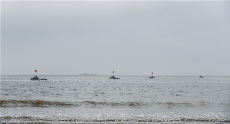 Amphibious mechanized infantry regiment executes coordinated training