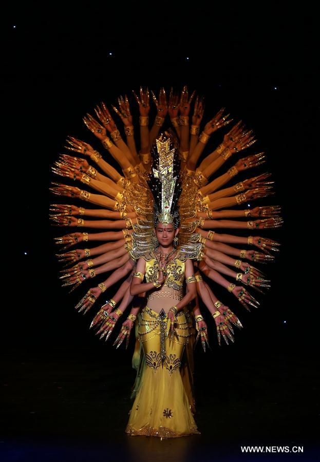 An artist from China Disabled People's Performing Art Troupe dances in 'Butterfly Lovers' during the performance of 'Chinese Dream, My Dream' in Neu Isenburg near Frankfurt, Germany, Sept. 19, 2016. (Xinhua/Luo Huanhuan) 