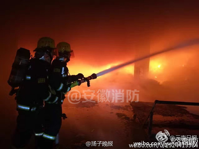 Exhausted firefighters spotted sleeping in street
