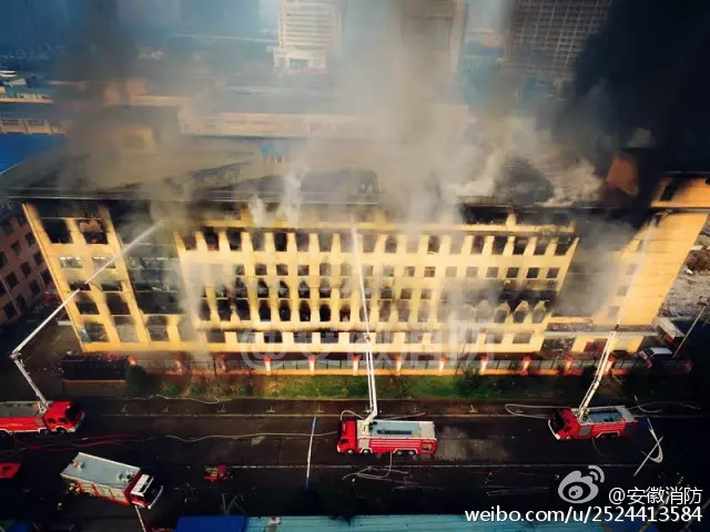 Exhausted firefighters spotted sleeping in street