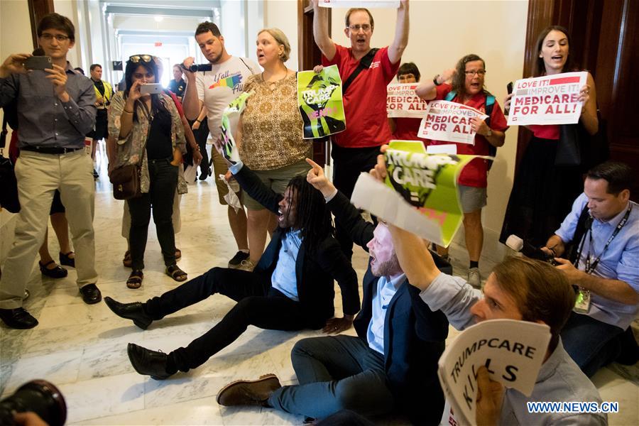 People protest against Republican health care bill in Washington D.C.