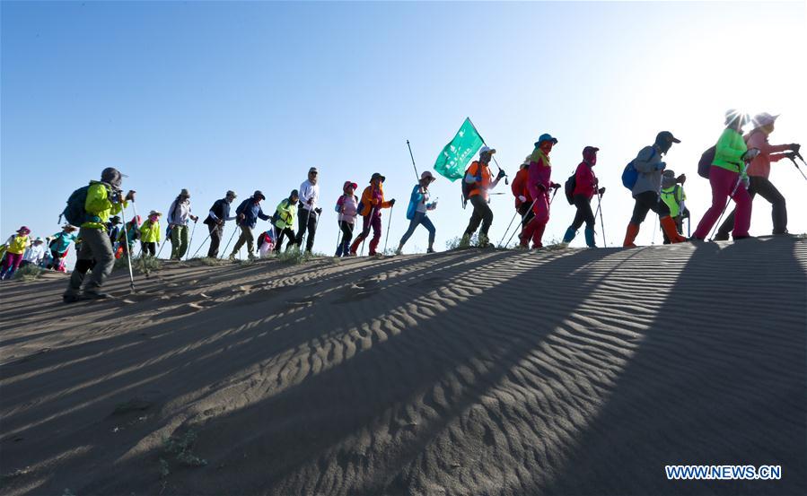 10 kilometer desert hiking challenge competition held in Zhangye, NW China