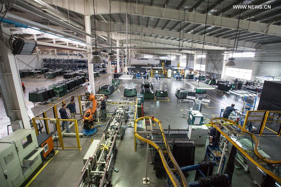 Workers busy at Russian factory of China's Fuyao Glass in Kaluga