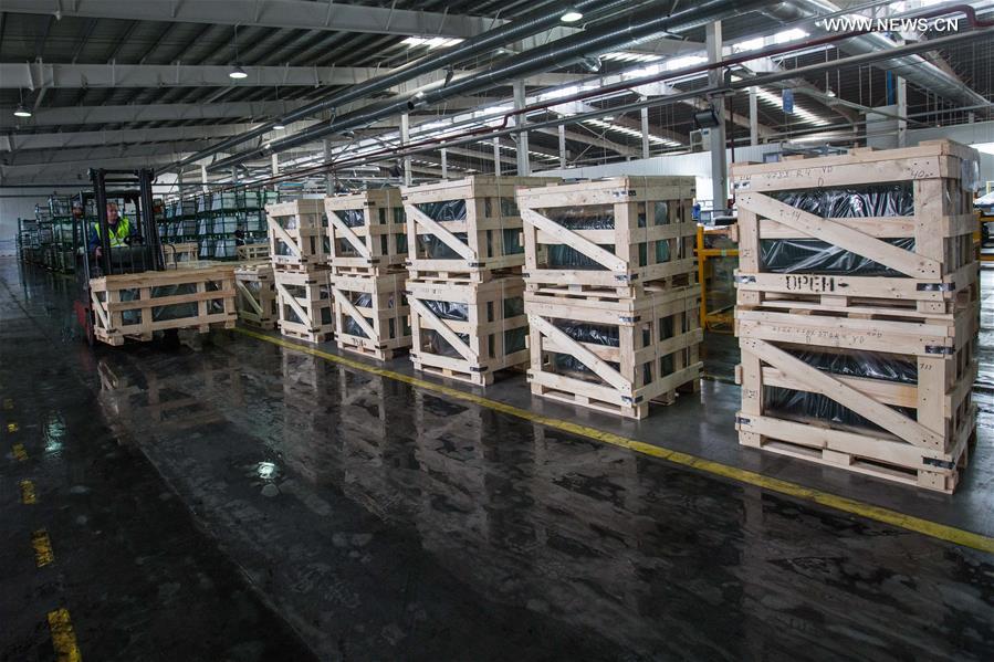 Workers busy at Russian factory of China's Fuyao Glass in Kaluga