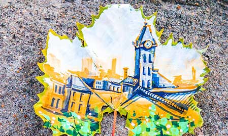 A fancy world painted on fallen leaves