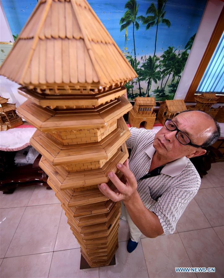 70-year-old makes handicrafts using discarded wooden sticks