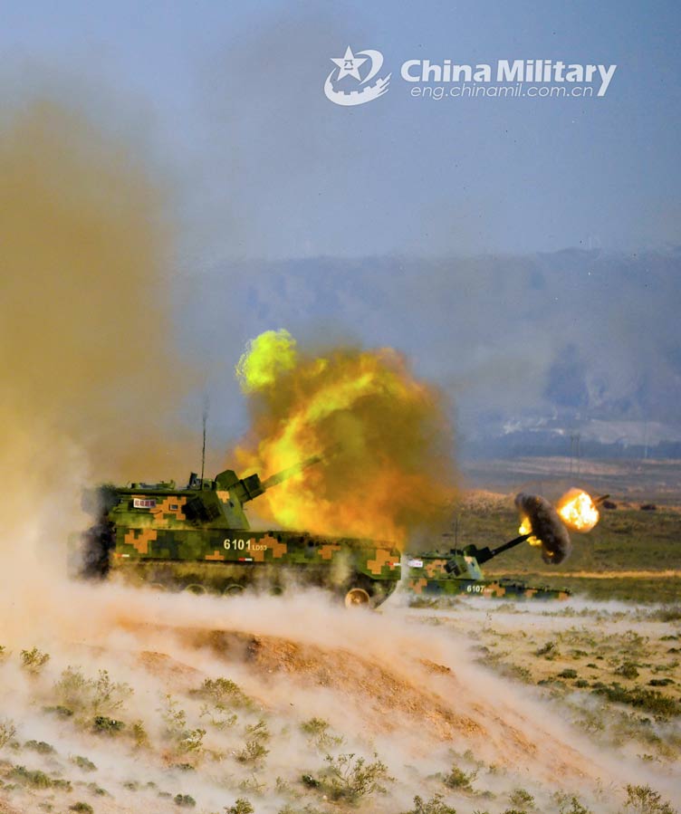 Armored vehicles en route to training field