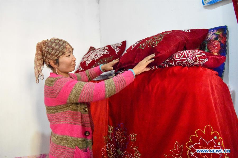 Construction work of 20 residential buildings completed in Axili, Xinjiang