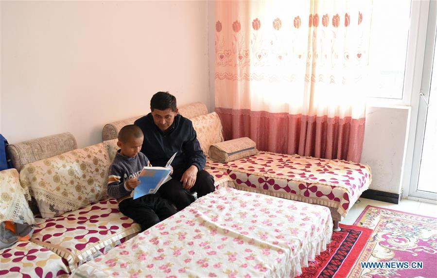 Construction work of 20 residential buildings completed in Axili, Xinjiang