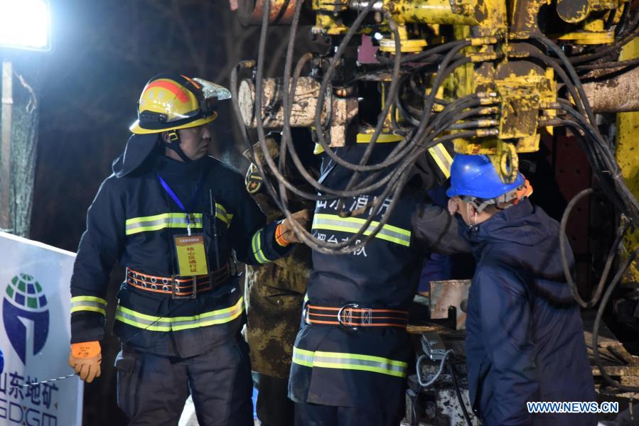 Paper slip from mine says 12 workers trapped still alive