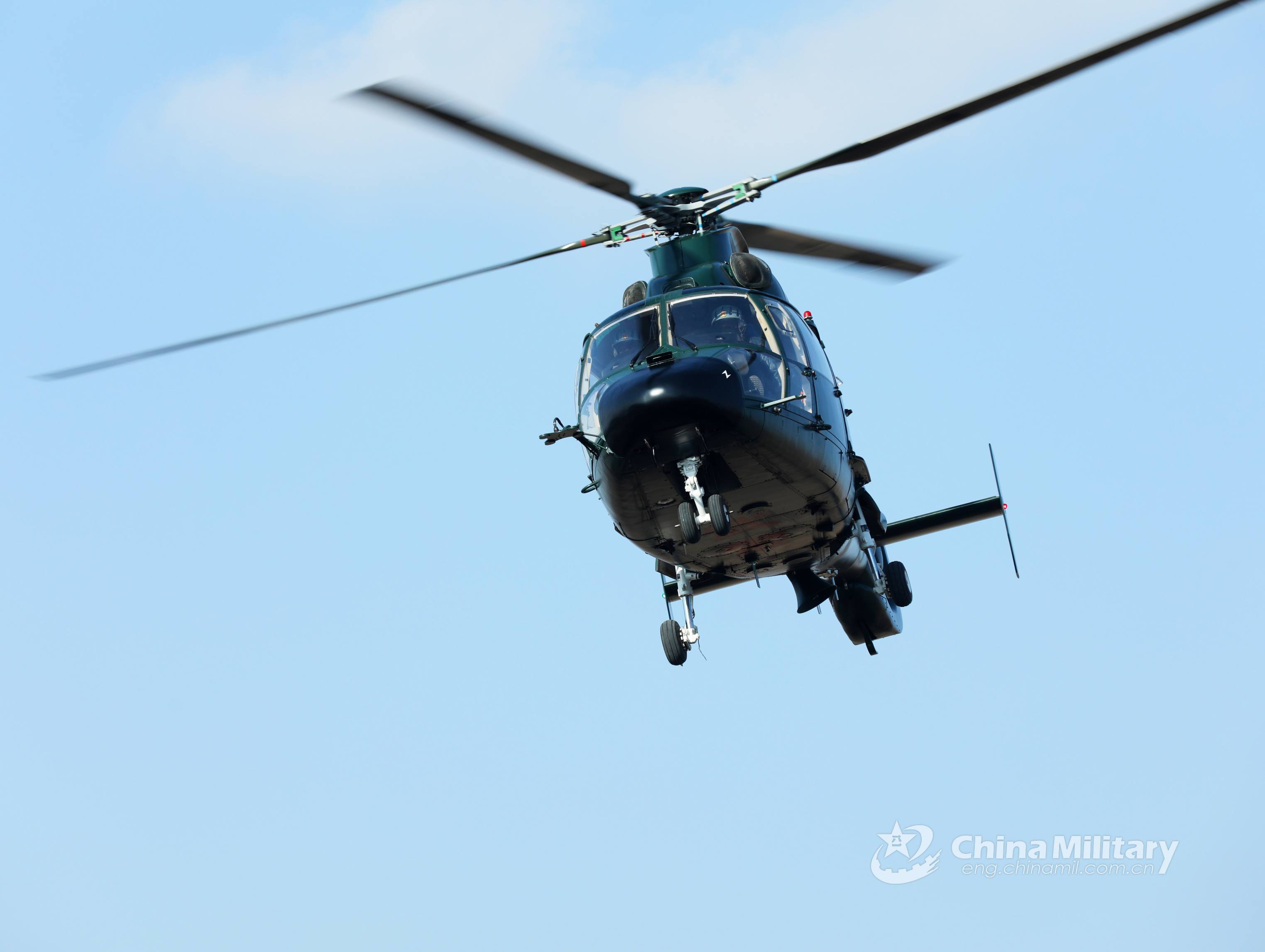 PAP service members manipulate attack helicopters in flight mission