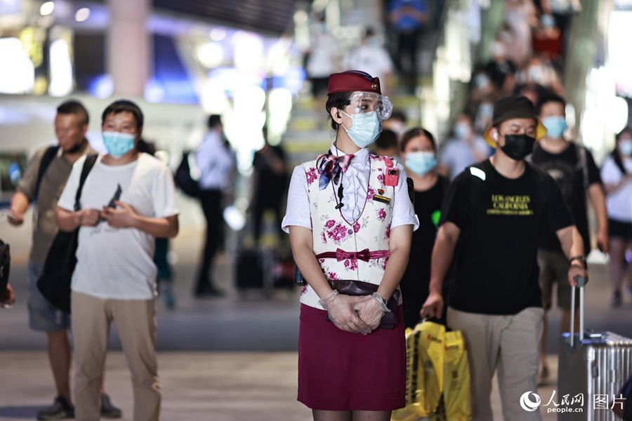 Train attendant witnesses changes brought by high-speed railway service in SW China