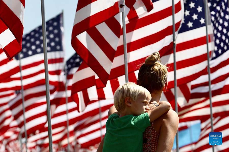 Waves of Flags displayed to honor victims of 9/11 attacks in U.S.