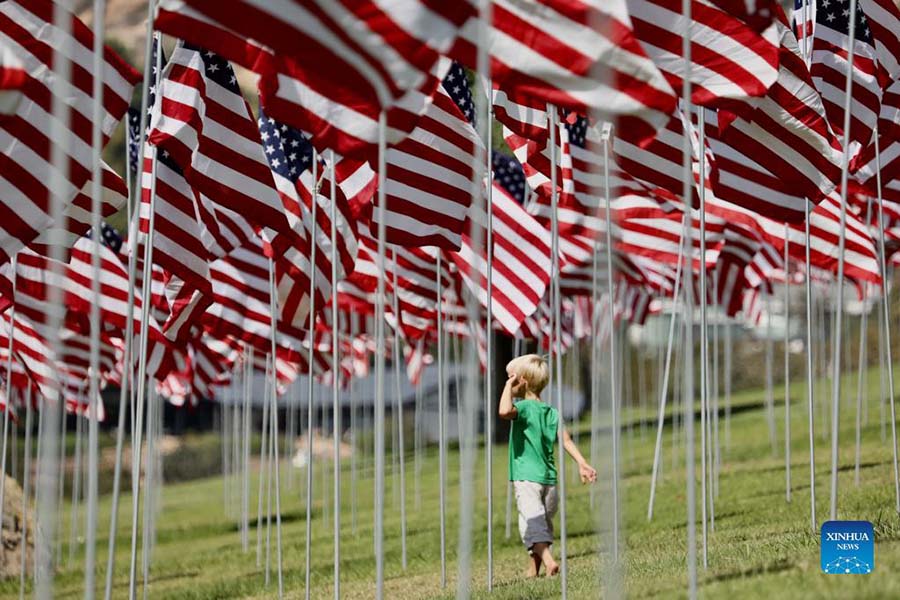 Waves of Flags displayed to honor victims of 9/11 attacks in U.S.