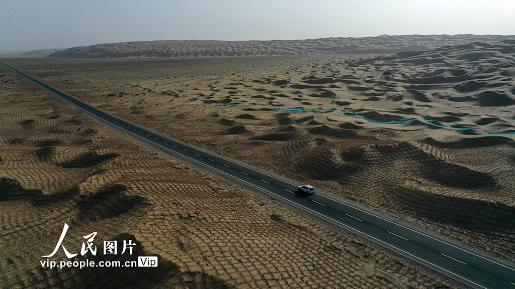 Expressway running across desert to open to traffic in China’s Xinjiang