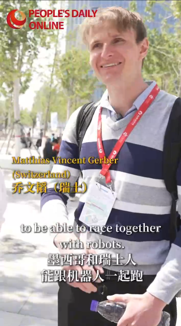 Foreign runners wowed by world's first humanoid robot half marathon