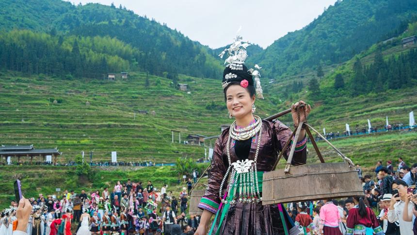 Fashion catwalk set against terraced fields in SW China's Guizhou