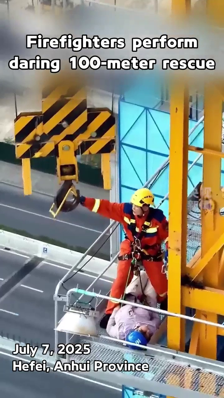 Firefighters perform daring 100-meter rescue