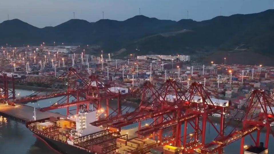 Heavy traffic moves through China's Ningbo-Zhoushan Port, the world's top cargo hub