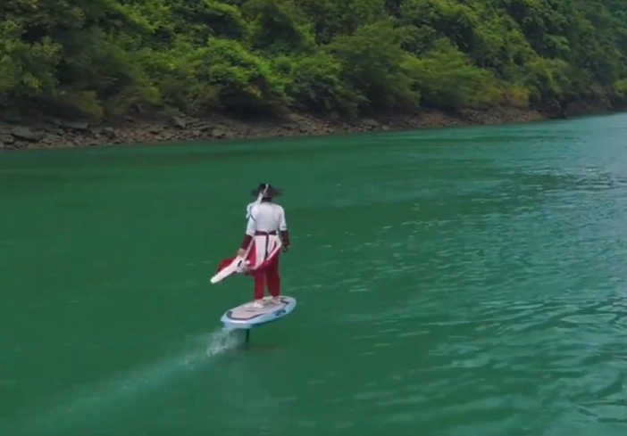 ??E-foiling over emerald waters