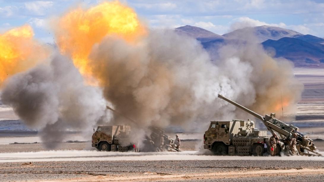 Multi-type artilleries spit fire at targets
