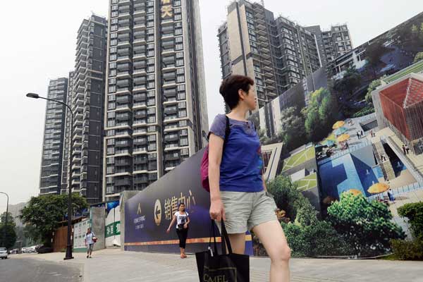 Seventy-one cities posted month-on-month increases in new home prices in August among 100 cities on the mainland. The government plans to launch pilot property tax programs in more cities to cool the market. [LI QIAOQIAO/ XINHUA]