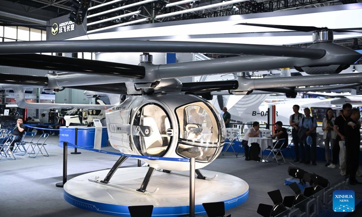 This photo taken on Nov. 13, 2024 shows exhibits related to low-altitude economy at Airshow China in Zhuhai, south China's Guangdong Province. A low-altitude economy area is set at the 15th China International Aviation and Aerospace Exhibition, also known as Airshow China, showcasing related products and application scenarios. (Photo: Xinhua)