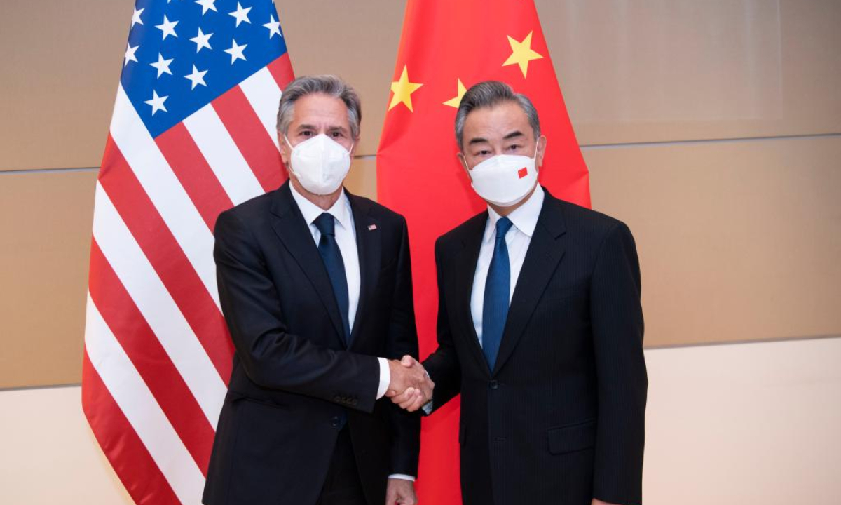 Chinese State Councilor and Foreign Minister Wang Yi (R) shakes hands with US Secretary of State Antony Blinken during their meeting at the site of the Permanent Mission of the People's Republic of China to the United Nations in New York, on Sep 23, 2022. Photo:Xinhua