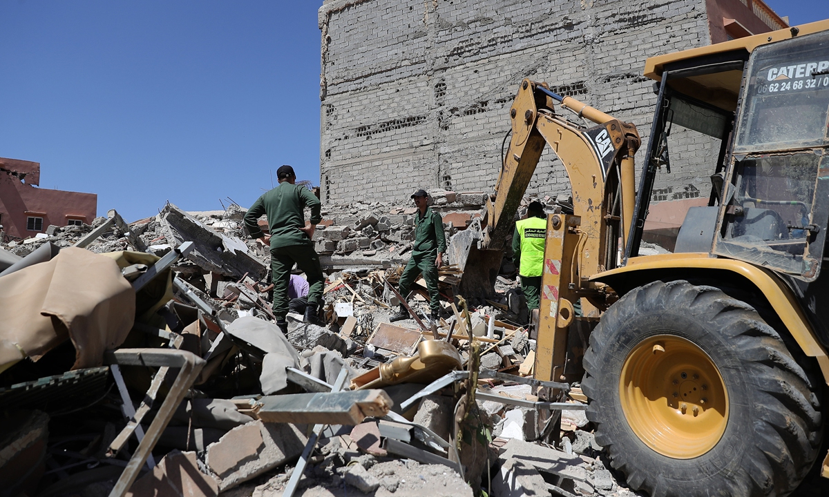 Rescue workers search through the rubble for survivors after the earthquake in a village in Marrakesh, Morocco, on September 11, 2023. Photo: Xinhua