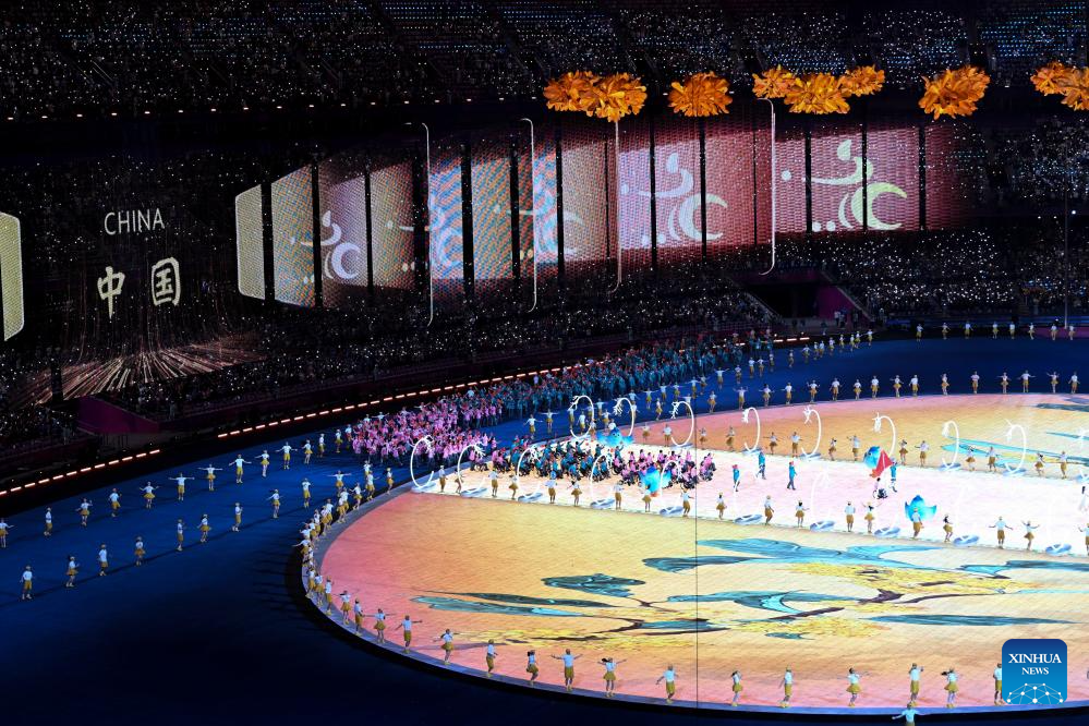 Delegations parade into stadium during opening ceremony of 4th Asian Para Games in Hangzhou