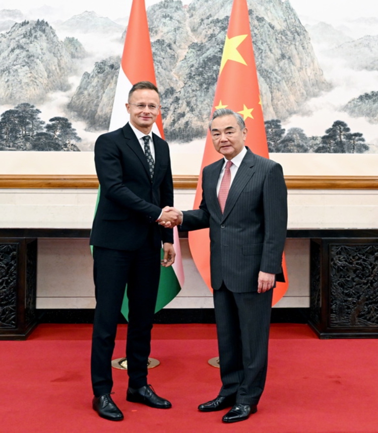 Chinese Foreign Minister Wang Yi, also a member of the Political Bureau of the Communist Party of China Central Committee, meets with Hungarian Minister of Foreign Affairs and Trade Peter Szijjarto, who is in China to attend commemorations marking the 80th anniversary of the victory in the Chinese People's War of Resistance against Japanese Aggression and the World Anti-Fascist War, in Beijing, capital of China, September 2025.  Photo: Ministry of Foreign Affairs