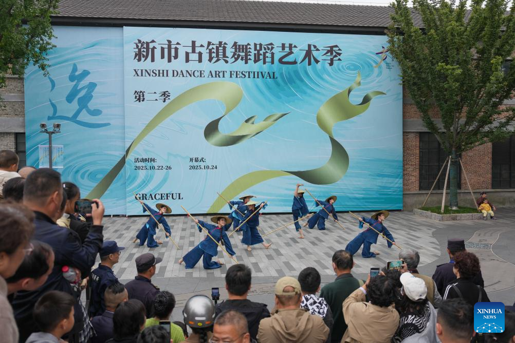 In pics: dance art festival in ancient town of Xinshi, China's Zhejiang
