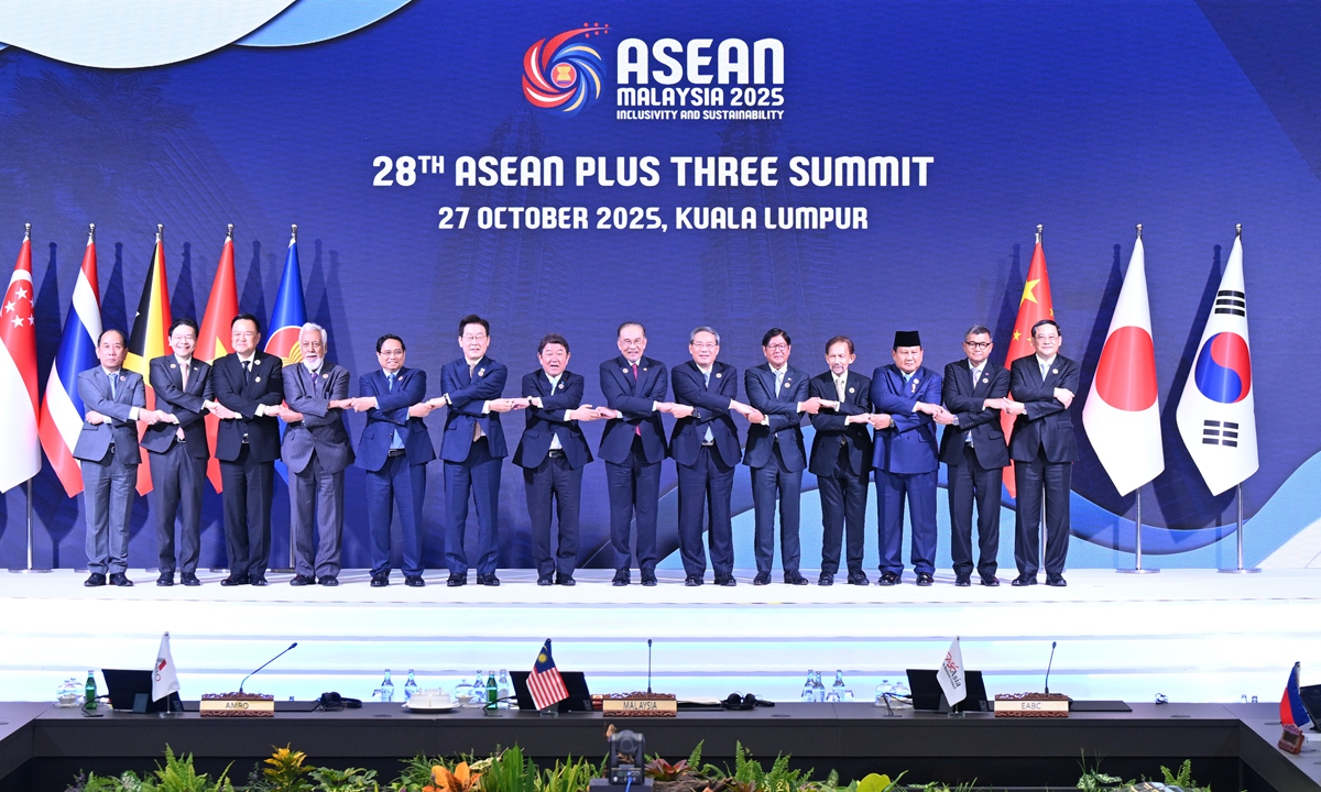 Chinese Premier Li Qiang poses for a group photo while attending the 28th ASEAN Plus Three Summit in Kuala Lumpur, Malaysia, October 27, 2025. Photo: Xinhua