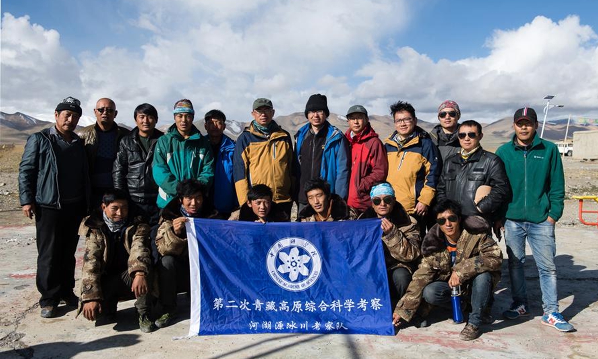Members of a research team of China's second scientific expedition on the Qinghai-Tibet Plateau pose for a group photo in southwest China's Xizang Autonomous Region, Sept. 13, 2017. Photo: Xinhua